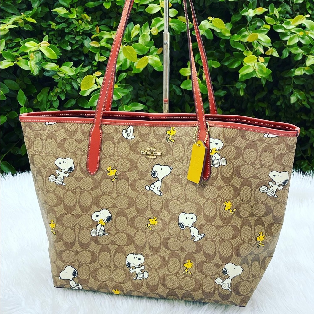 Coach X Peanuts City Tote In Signature Canvas With Snoopy Woodstock Print